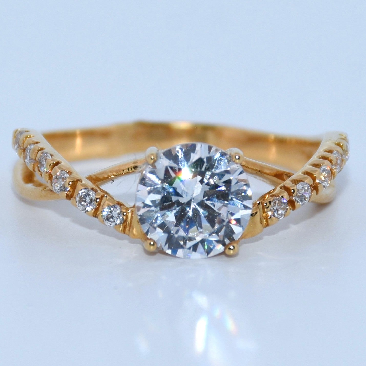 19.2K Portuguese Gold | Criss Cross CZ Ring