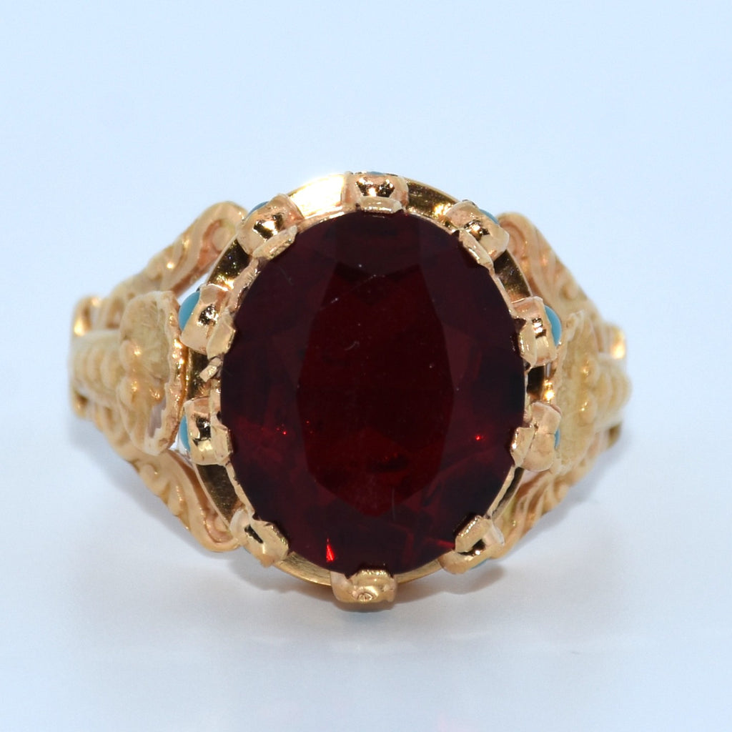 19.2K Portuguese Gold | Oval Garnet Ring