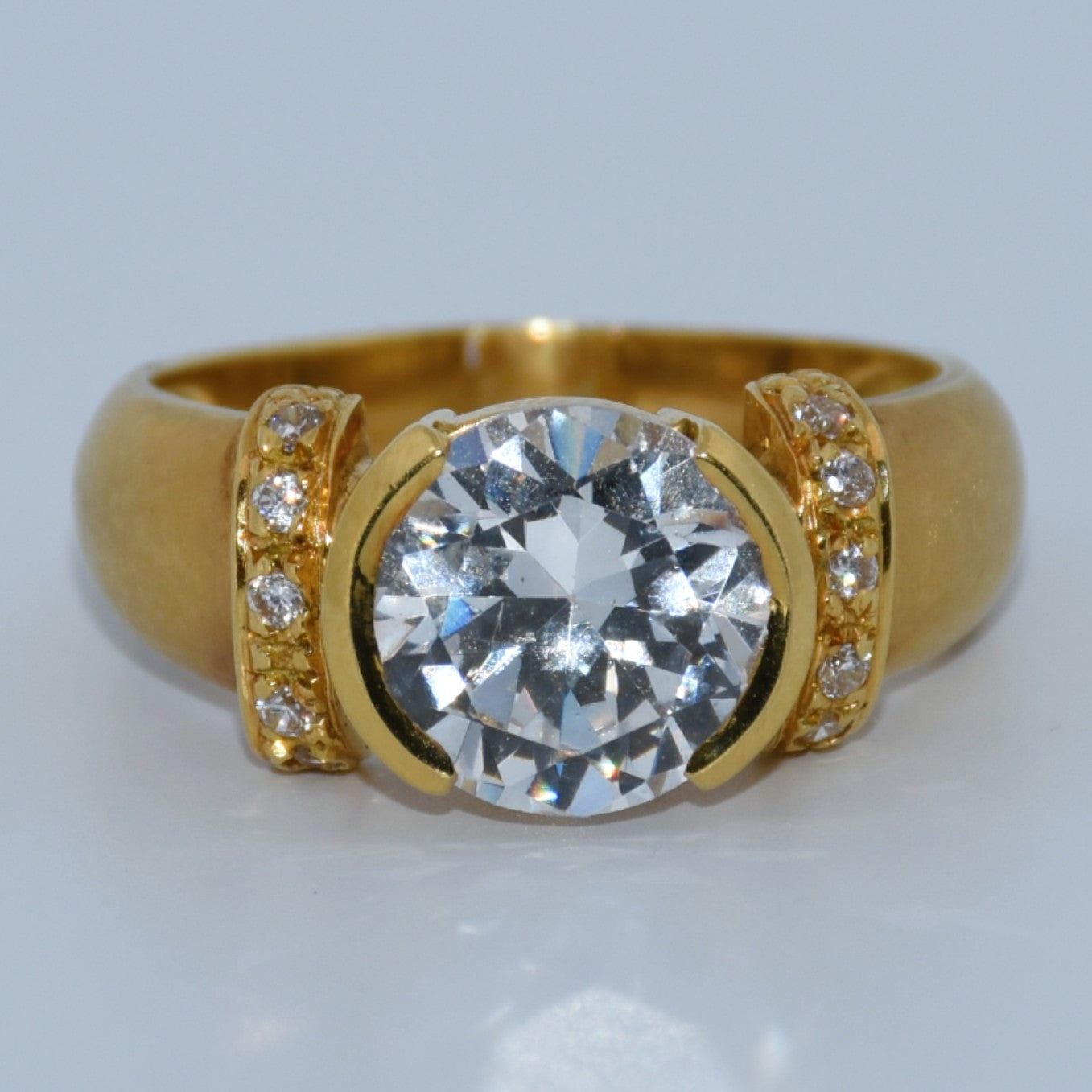 19.2K Portuguese Gold | Round CZ Ring