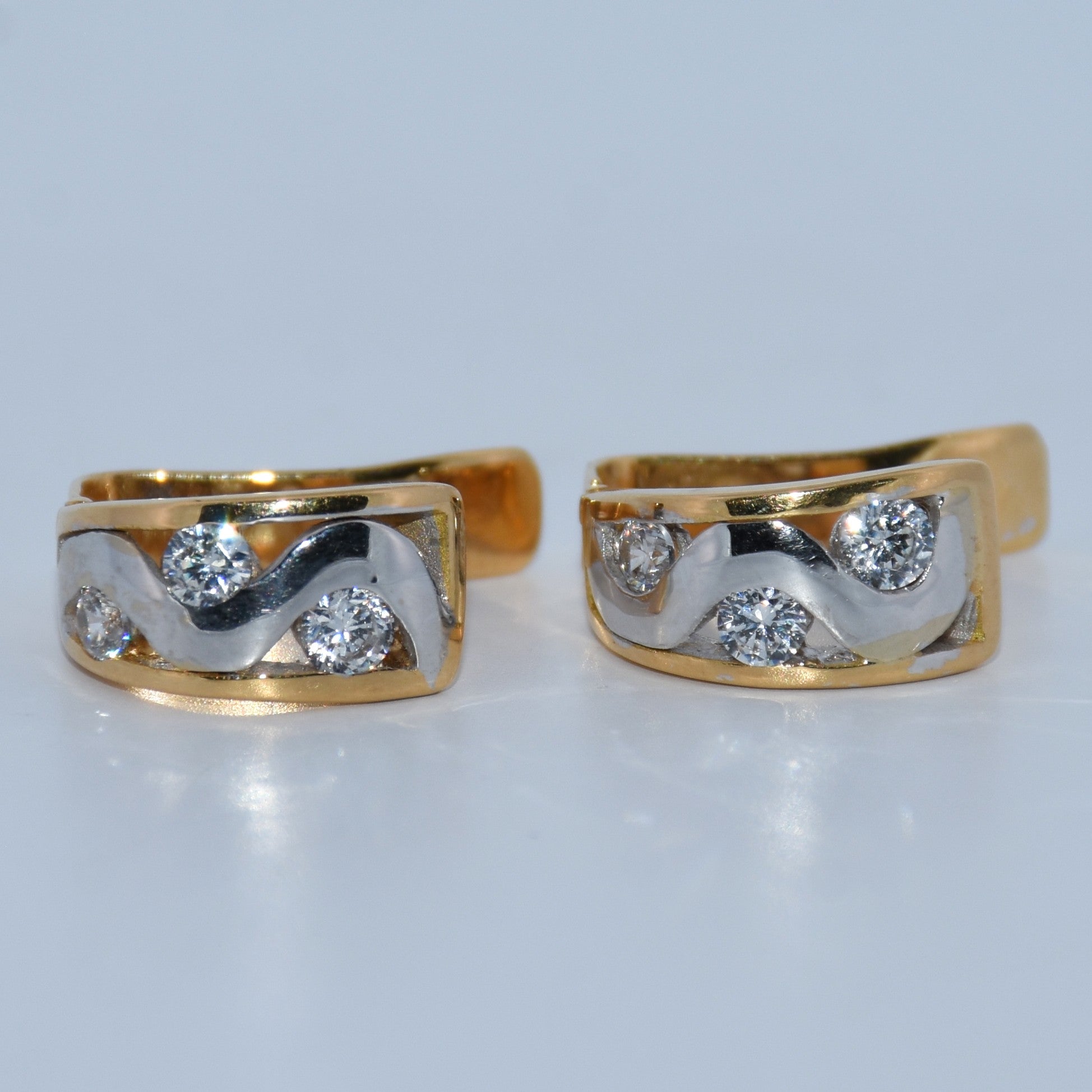 19.2K Portuguese Gold | Swirl Huggie Earrings with White Stones