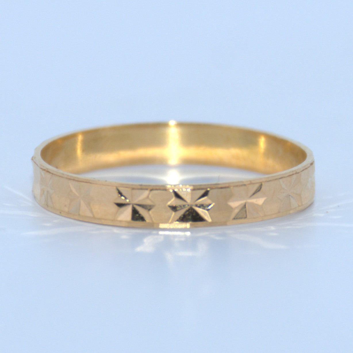 19.2K Portuguese Gold | Geometric Design Wedding Bands