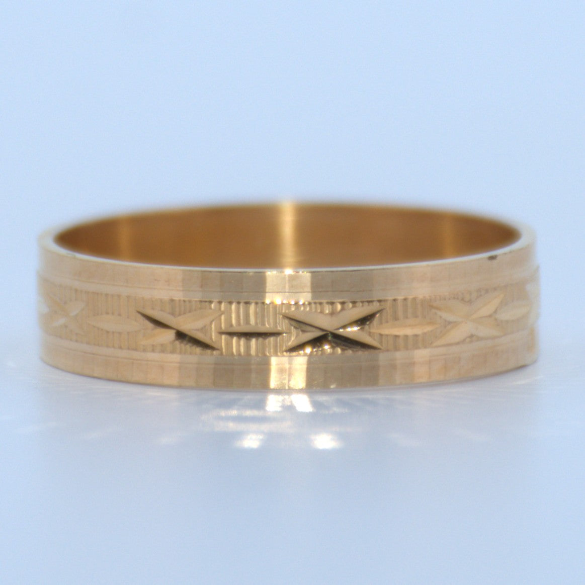 19.2K Portuguese Gold | Geometric Design Wedding Bands