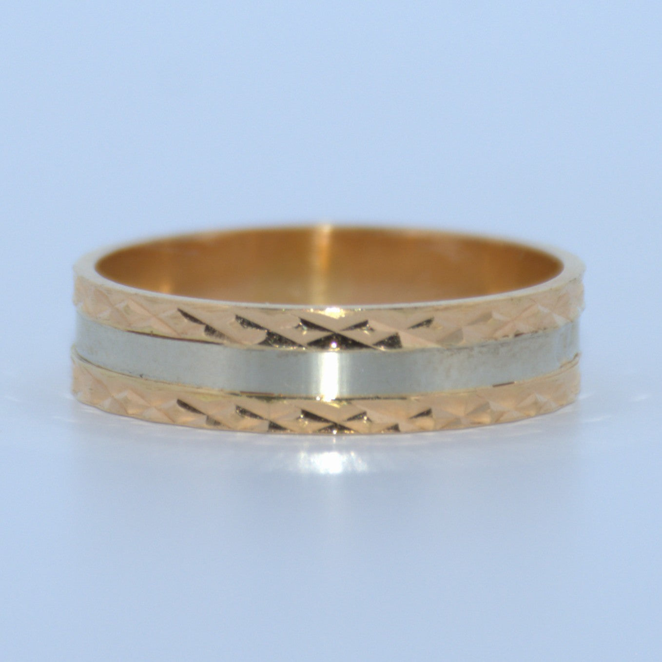 19.2K Portuguese Gold | Geometric Design Wedding Bands