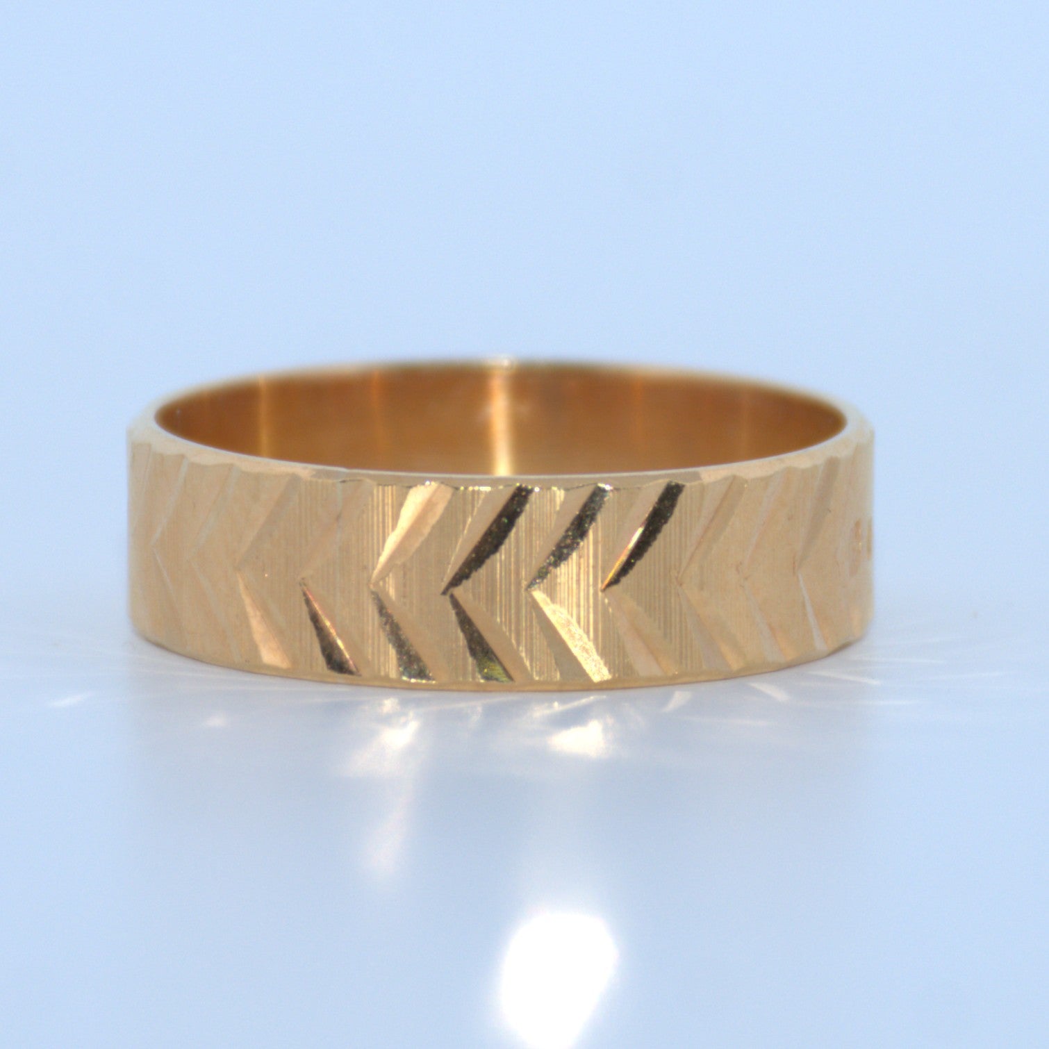 19.2K Portuguese Gold | Geometric Design Wedding Bands